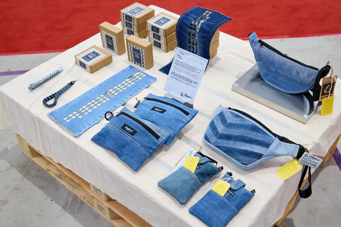 Event photography of a product display table at a Hangzhou trade exhibition