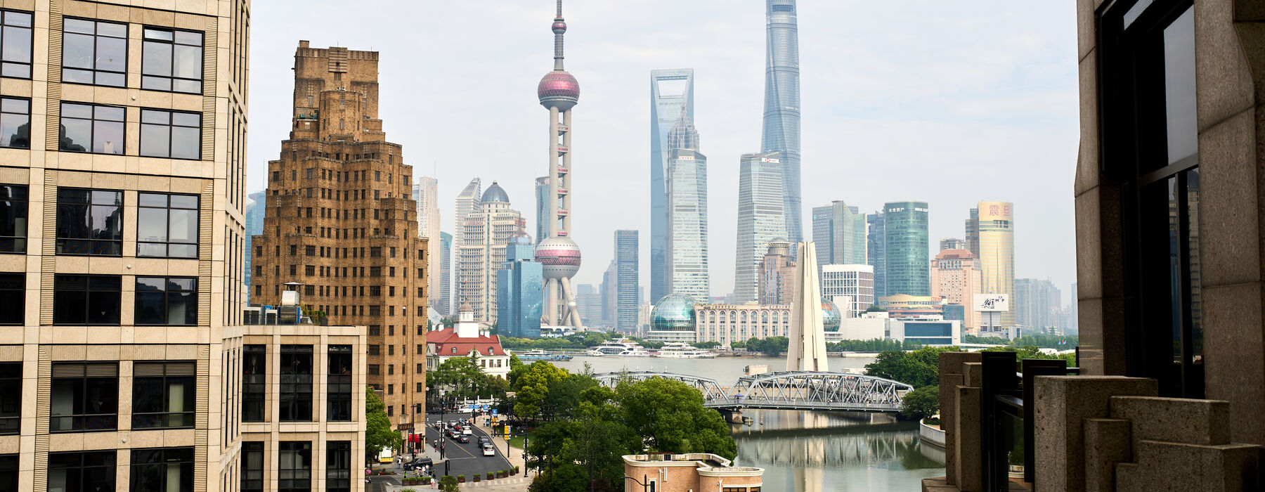 Shanghai skyline from the Bund toward Lujiazui, event content direction across the city